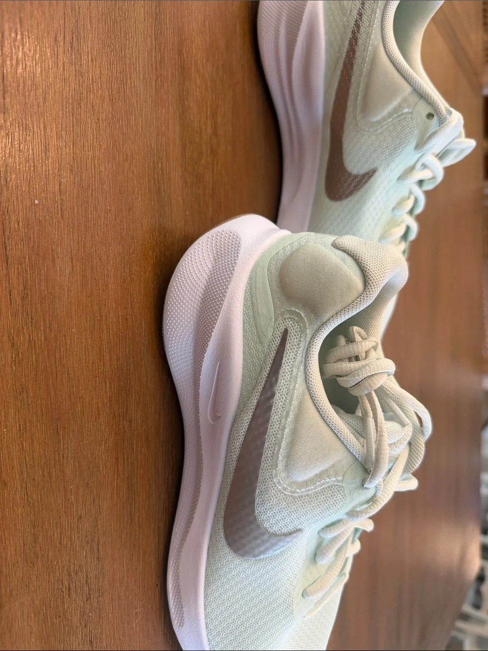 Nike Women's Seafoam Mint Running Sneakers with silver Swoosh